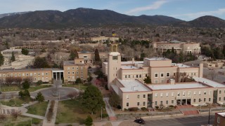 DX0002_131_002 - 5.7K aerial stock footage of a close orbit of the Bataan Memorial Building in Santa Fe, New Mexico