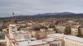 DX0002_131_012 - 5.7K aerial stock footage flyby downtown to reveal tower on Bataan Memorial Building, Santa Fe, New Mexico