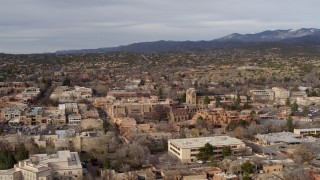 DX0002_131_014 - 5.7K aerial stock footage fly away from and past downtown area of Santa Fe, New Mexico