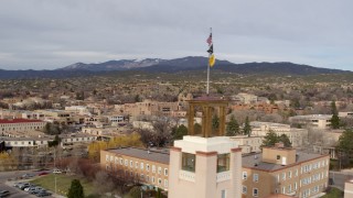 DX0002_131_019 - 5.7K aerial stock footage flyby downtown to reveal Bataan Memorial Building, Santa Fe, New Mexico