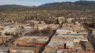 DX0002_131_021 - 5.7K aerial stock footage of orbiting Santa Fe Plaza with a view of the cathedral, Santa Fe, New Mexico