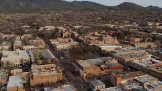 DX0002_131_023 - 5.7K aerial stock footage of a reverse view of Santa Fe Plaza in downtown, Santa Fe, New Mexico