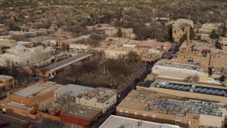 DX0002_131_029 - 5.7K aerial stock footage of a reverse view of Santa Fe Plaza in Santa Fe, New Mexico