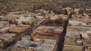 DX0002_131_030 - 5.7K aerial stock footage of a view of Santa Fe Plaza during ascent in Santa Fe, New Mexico