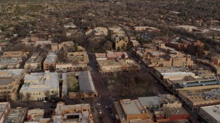 DX0002_131_031 - 5.7K aerial stock footage orbit Santa Fe Plaza with view of cathedral in Santa Fe, New Mexico