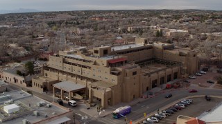 DX0002_131_039 - 5.7K aerial stock footage of flying toward the Eldorado Hotel & Spa hotel, Santa Fe, New Mexico