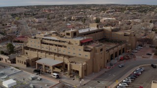 DX0002_131_040 - 5.7K aerial stock footage a reverse view of the Eldorado Hotel & Spa hotel, Santa Fe, New Mexico