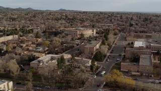 DX0002_131_042 - 5.7K aerial stock footage a wide orbit of the New Mexico State Capitol, Santa Fe, New Mexico