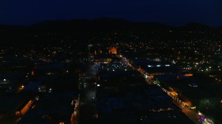 DX0002_132_027 - 5.7K aerial stock footage an orbit of Santa Fe Plaza near the cathedral at night, Santa Fe, New Mexico