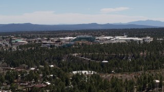 DX0002_133_029 - 5.7K aerial stock footage wide reverse view of the Los Alamos National Laboratory, New Mexico