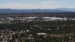 DX0002_133_030 - 5.7K aerial stock footage wide view of the Los Alamos National Laboratory during ascent, New Mexico