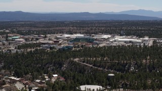 DX0002_133_031 - 5.7K aerial stock footage wide stationary view and approach to the Los Alamos National Laboratory, New Mexico