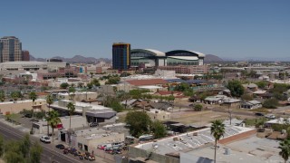 DX0002_136_035 - 5.7K aerial stock footage of a condominium complex and baseball stadium, Downtown Phoenix, Arizona