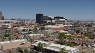 DX0002_136_038 - 5.7K aerial stock footage of condominium complex and baseball stadium, Downtown Phoenix, Arizona