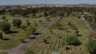 DX0002_137_024 - 5.7K aerial stock footage flyby graves at a cemetery in Phoenix, Arizona