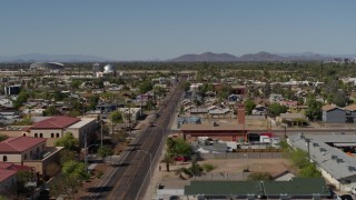 DX0002_137_044 - 5.7K aerial stock footage flying by neighborhoods around 15th Avenue in Phoenix, Arizona