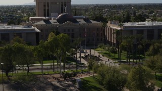DX0002_137_059 - 5.7K aerial stock footage of the front of Arizona State Capitol building in Phoenix, Arizona