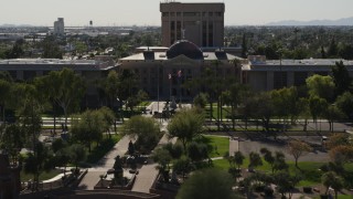 DX0002_137_065 - 5.7K stock footage aerial video a reverse view and orbit of the Arizona State Capitol building in Phoenix, Arizona