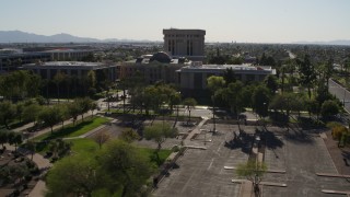 DX0002_138_004 - 5.7K aerial stock footage flying over plaza while focused the Arizona State Capitol building in Phoenix, Arizona