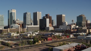 DX0002_138_008 - 5.7K aerial stock footage flying by the city's high-rise office buildings in Downtown Phoenix, Arizona