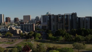 DX0002_138_020 - 5.7K aerial stock footage passing cultural center, hotel and condo complex in Downtown Phoenix, Arizona