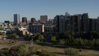 DX0002_138_021 - 5.7K aerial stock footage passing condo complex, cultural center and hotel in Downtown Phoenix, Arizona