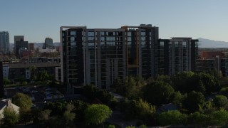 DX0002_138_022 - 5.7K aerial stock footage of approaching a condominium complex in Downtown Phoenix, Arizona