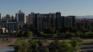 DX0002_138_024 - 5.7K aerial stock footage of orbiting a condominium complex in Downtown Phoenix, Arizona