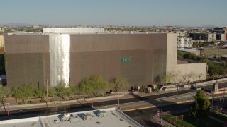 DX0002_138_025 - 5.7K aerial stock footage of orbiting a public library building in Phoenix, Arizona