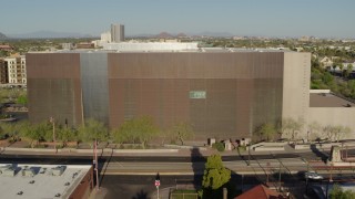 DX0002_138_026 - 5.7K aerial stock footage of an orbit of a public library building in Phoenix, Arizona