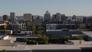 DX0002_138_032 - 5.7K stock footage aerial video of high-rise office buildings in the distance in Downtown Phoenix, Arizona