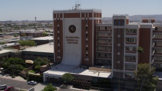 DX0002_140_017 - 5.7K stock footage aerial video of orbiting the Maricopa Medical Center in Phoenix, Arizona