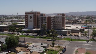 DX0002_140_020 - 5.7K stock footage aerial video of orbiting a hospital complex in Phoenix, Arizona