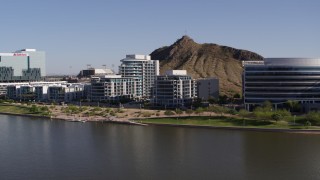 DX0002_142_004 - 5.7K aerial stock footage of approaching a riverfront condominium complex in Tempe, Arizona