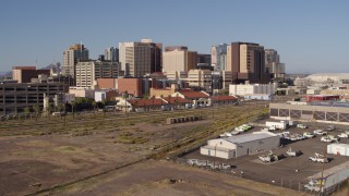 DX0002_142_025 - 5.7K aerial stock footage of train station and skyline in Downtown Phoenix, Arizona