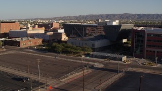 DX0002_142_038 - 5.7K aerial stock footage of the Maricopa County Sheriff’s Office at sunset in Downtown Phoenix, Arizona