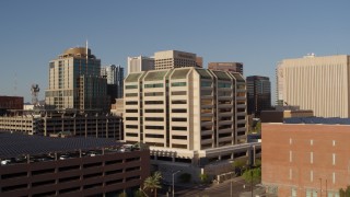 DX0002_142_040 - 5.7K aerial stock footage flyby county office building for view of high-rise office buildings in Downtown Phoenix, Arizona