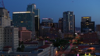 DX0002_143_057 - 5.7K aerial stock footage of towering office buildings, seen from near Westward Ho building at twilight, Downtown Phoenix, Arizona