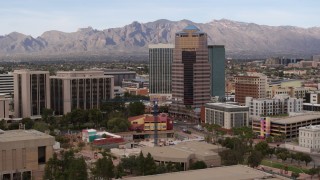 DX0002_145_015 - 5.7K aerial stock footage orbit One South Church office high-rise in Downtown Tucson, Arizona
