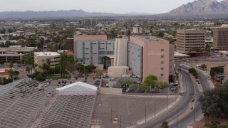 DX0002_145_027 - 5.7K aerial stock footage of orbiting a district court building in Downtown Tucson, Arizona