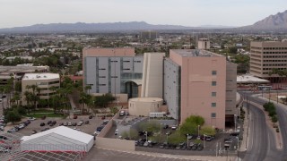 DX0002_145_028 - 5.7K aerial stock footage of an orbit of a district court building in Downtown Tucson, Arizona