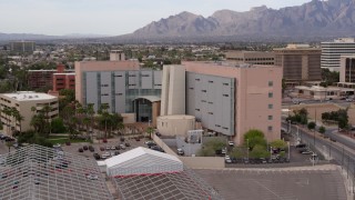 DX0002_145_029 - 5.7K aerial stock footage of slowly approaching a district court building in Downtown Tucson, Arizona