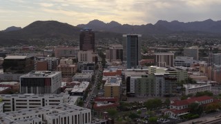 DX0002_145_043 - 5.7K aerial stock footage ascend for view of Congress Street between office towers in Downtown Tucson, Arizona