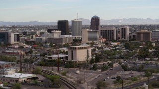 DX0002_146_007 - 5.7K aerial stock footage approach three office towers behind university office building in Downtown Tucson, Arizona