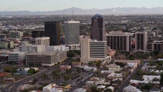 DX0002_146_009 - 5.7K aerial stock footage slowly fly away from three office towers in Downtown Tucson, Arizona