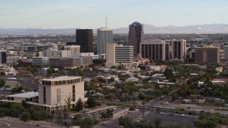 DX0002_146_010 - 5.7K aerial stock footage slowly fly away from three office towers in Downtown Tucson, Arizona