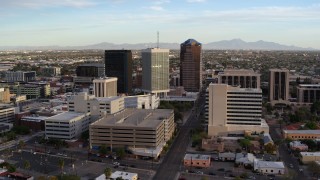 DX0002_146_016 - 5.7K aerial stock footage of an orbit of three office towers in Downtown Tucson, Arizona