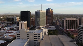 DX0002_146_019 - 5.7K aerial stock footage of circling the three office towers in Downtown Tucson, Arizona