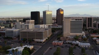 DX0002_146_022 - 5.7K aerial stock footage reverse view of Bank of America Plaza office tower in Downtown Tucson, Arizona