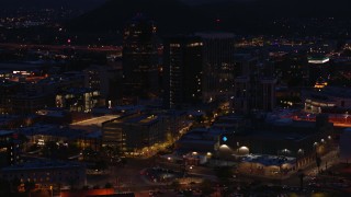 DX0002_147_034 - 5.7K aerial stock footage orbit three tall office towers at twilight, Downtown Tucson, Arizona